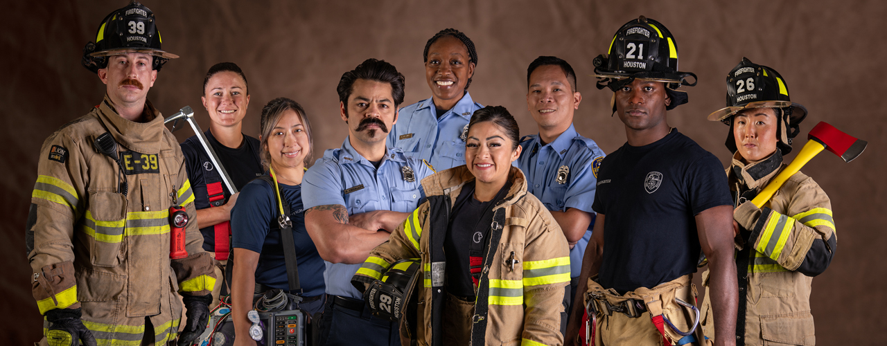 portrait of diffrent firefighters in a row