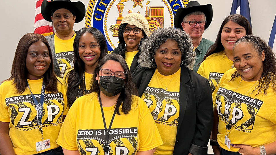 COH employees wearing ZIP tshirts