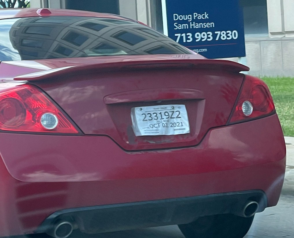 Suspect Vehicle: Two-Door Red Nissan Altima